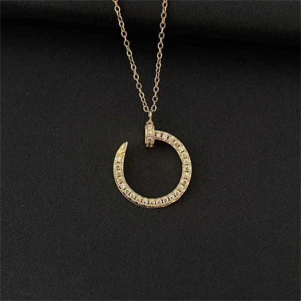 Luxury Curved Hook Nail Pendant Necklace - Image 9