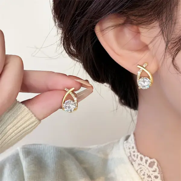 Elegant Cross Stud Earrings with Cubic Zirconia - Image 2
