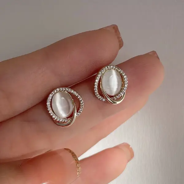 Asymmetrical Black Round Stud Earrings - Image 12