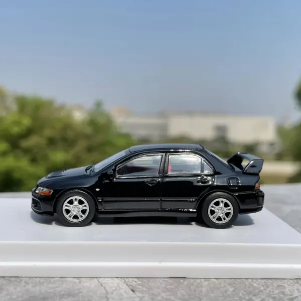 1:64 Scale Blue Mitsubishi Lancer EVO Model - Image 6