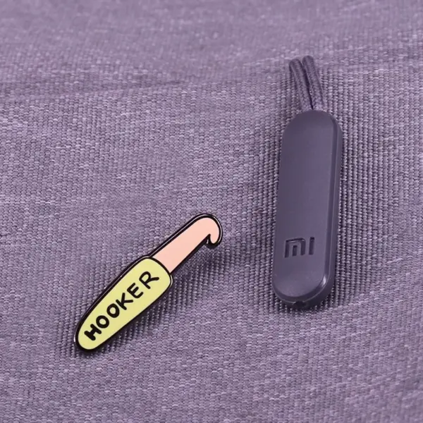 Crochet Hook Enamel Pin with Humorous Twist - Image 3