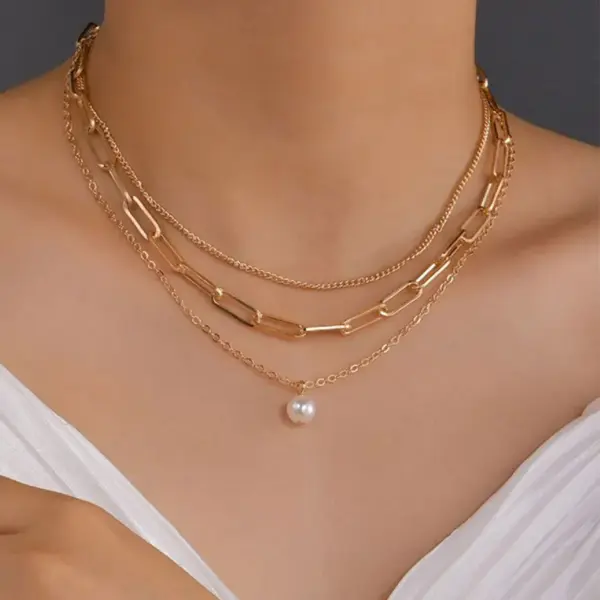Bohemian Pearl Charm Necklace with Crystal Details - Image 10