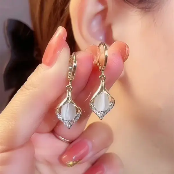 Asymmetrical Black Round Stud Earrings - Image 13
