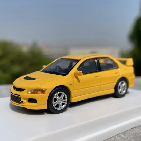 1:64 Scale Blue Mitsubishi Lancer EVO Model - Image 5