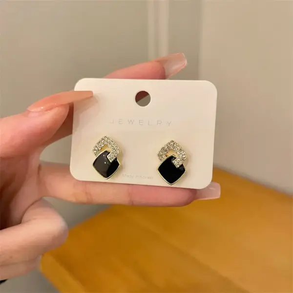 Asymmetrical Black Round Stud Earrings - Image 21