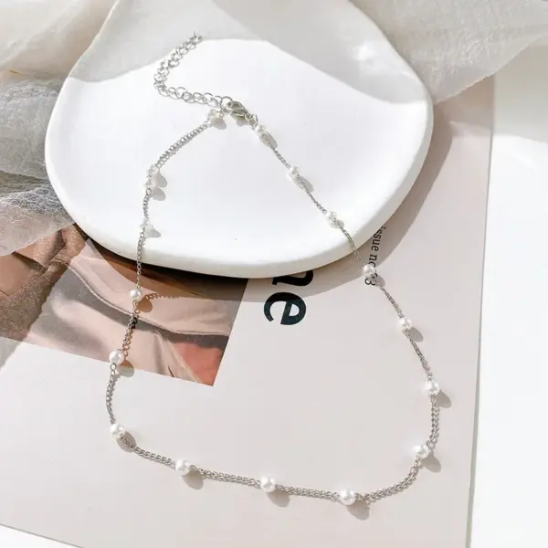 Bohemian Pearl Charm Necklace with Crystal Details - Image 12