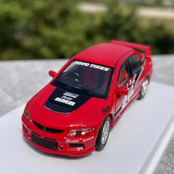 1:64 Scale Blue Mitsubishi Lancer EVO Model - Image 2
