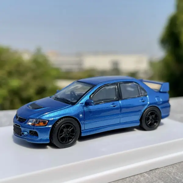 1:64 Scale Blue Mitsubishi Lancer EVO Model - Image 4