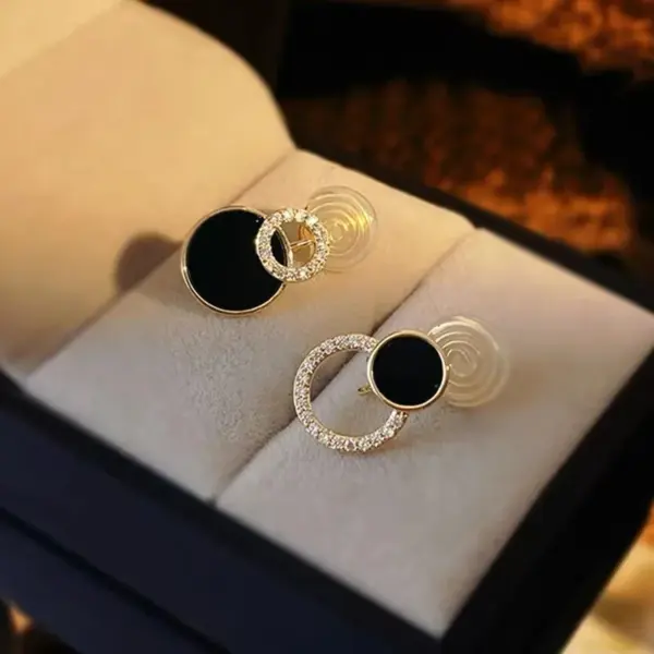 Asymmetrical Black Round Stud Earrings - Image 4