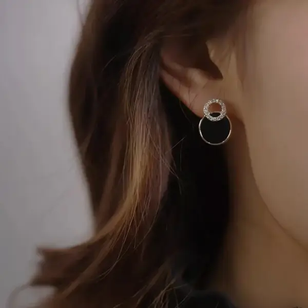 Asymmetrical Black Round Stud Earrings - Image 2