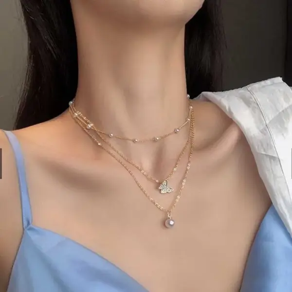 Bohemian Pearl Charm Necklace with Crystal Details - Image 9