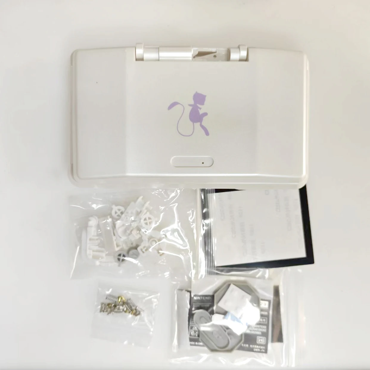 Nintendo DS First-Gen Full Housing Shell Kit in Vibrant Colors 2 Nintendo DS First-Gen Full Housing Shell Kit in Vibrant Colors - Image 2