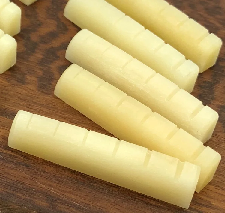 10 Pack Unbleached Bone Nuts for Acoustic Guitars 6 10 Pack Unbleached Bone Nuts for Acoustic Guitars - Image 6