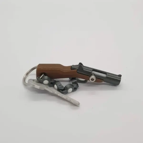 Mini Soft Bullet Gun Keychain Toy - Image 3