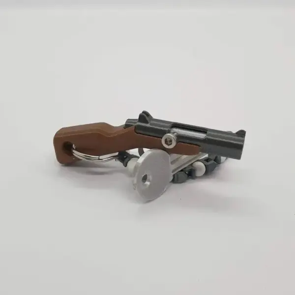 Mini Soft Bullet Gun Keychain Toy - Image 6
