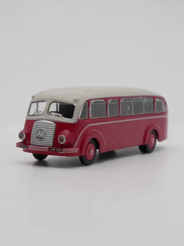 Vintage Red and Cream Diecast Bus Model - Image 4