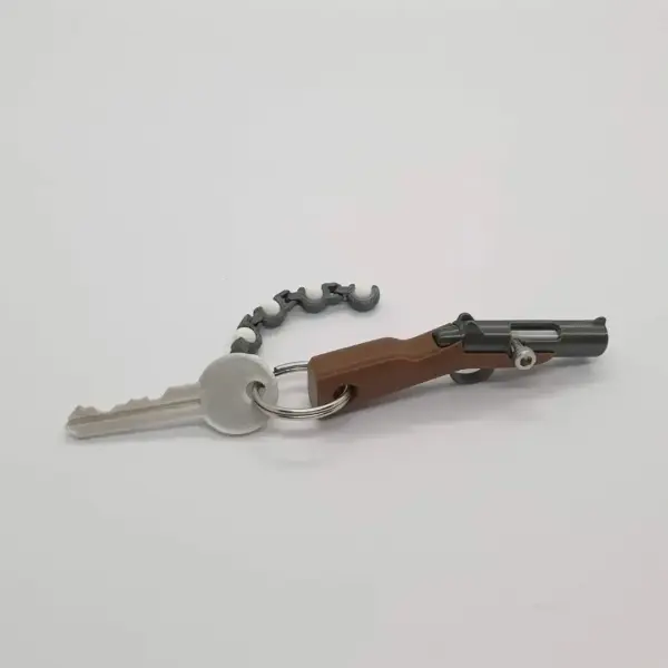 Mini Soft Bullet Gun Keychain Toy - Image 5