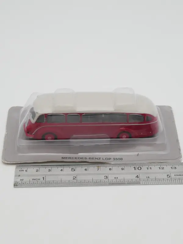 Vintage Red and Cream Diecast Bus Model - Image 6