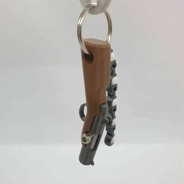 Mini Soft Bullet Gun Keychain Toy - Image 2