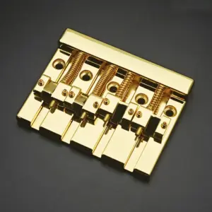 Vintage 4-String Bass Bridge in Shiny Gold 10 S4a68de8a9ab5478295a8f22814bdb9d6B