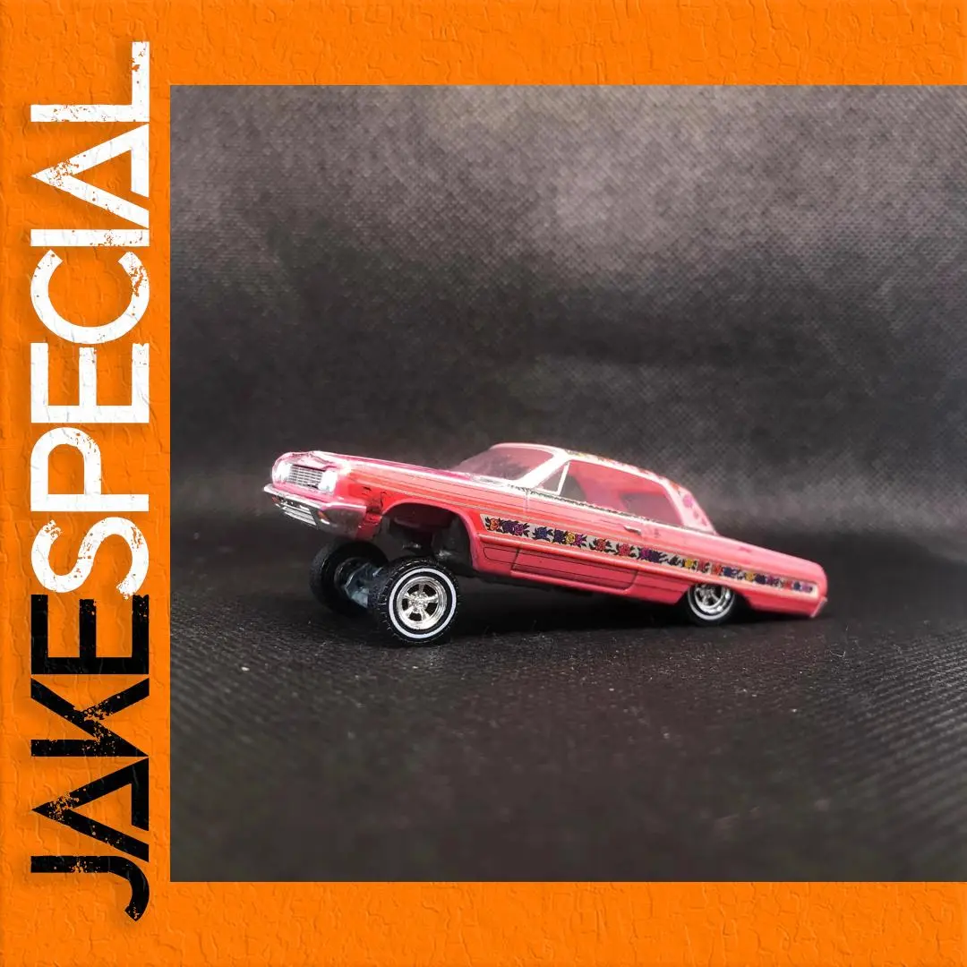 1:64 Scale Vibrant Red Model Jumping Car 1 1:64 Scale Vibrant Red Model Jumping Car