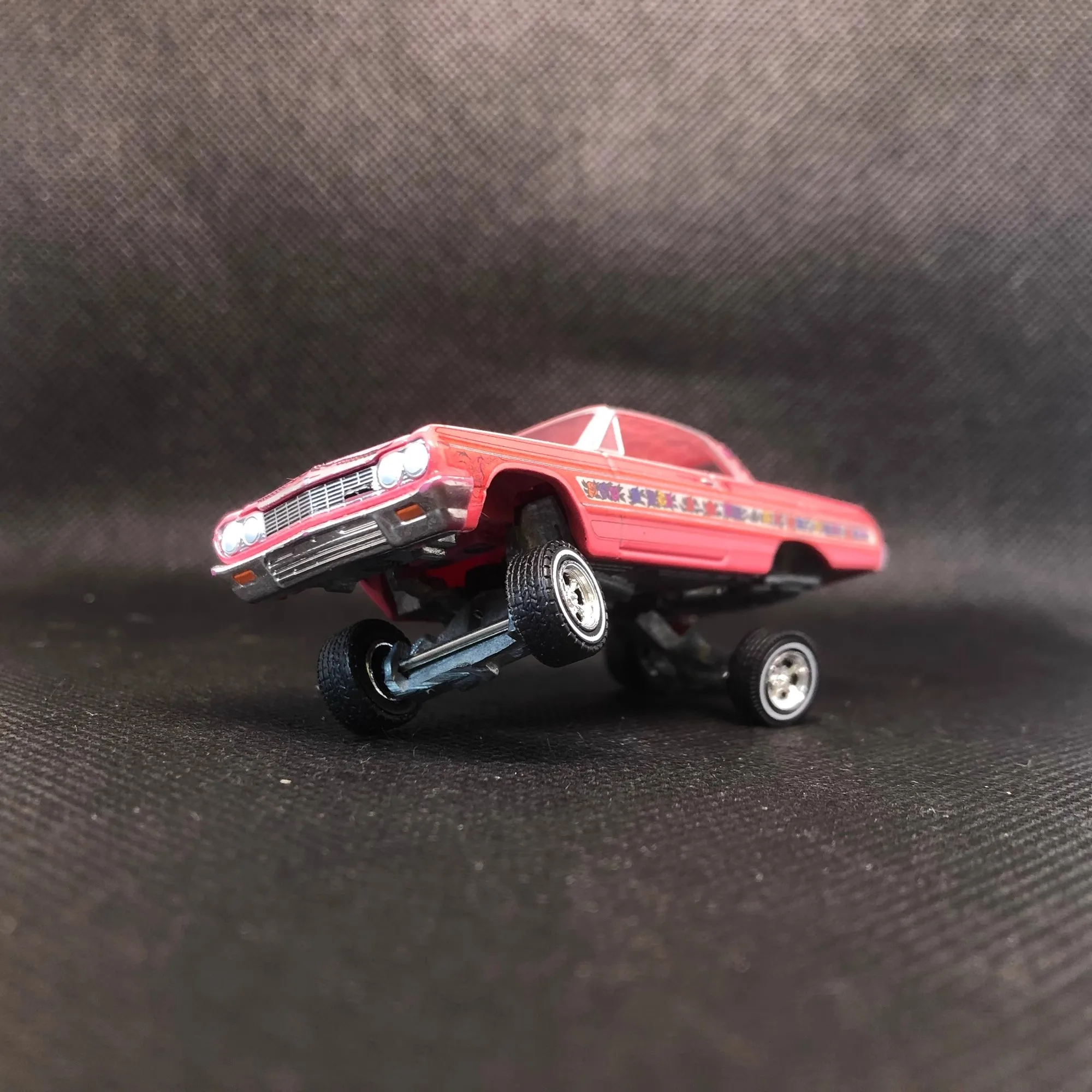 1:64 Scale Vibrant Red Model Jumping Car 4 1:64 Scale Vibrant Red Model Jumping Car - Image 4