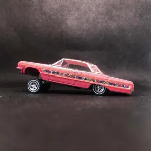 1:64 Scale Vibrant Red Model Jumping Car 7 S5f5cc71a5e0246ffab6a86b9ddaaef50g