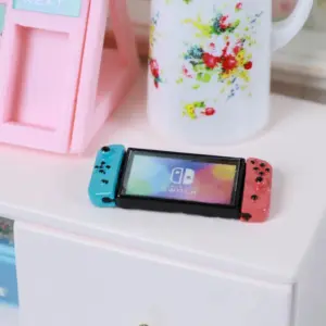 Miniature Gaming Console Collection in Vibrant Colors 15 Se008e9ce68944bce973273113bea1f7aw