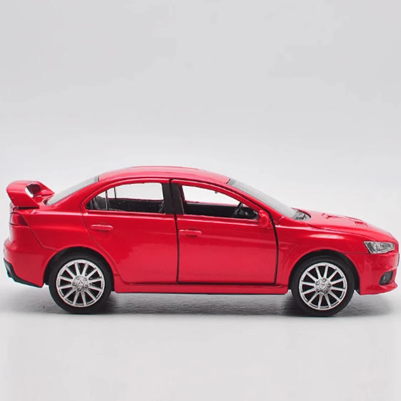 Welly 1:36 Lancer EVO Alloy Car Model Red 2 Welly 1:36 Lancer EVO Alloy Car Model Red - Image 2