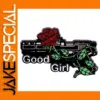 Gun and Rose Brooch with Good Girl Inscription