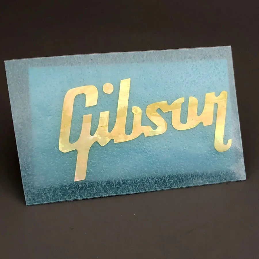 Gold Gibson Logo Guitar Decal Sticker 40x21mm 1 Gold Gibson Logo Guitar Decal Sticker 40x21mm