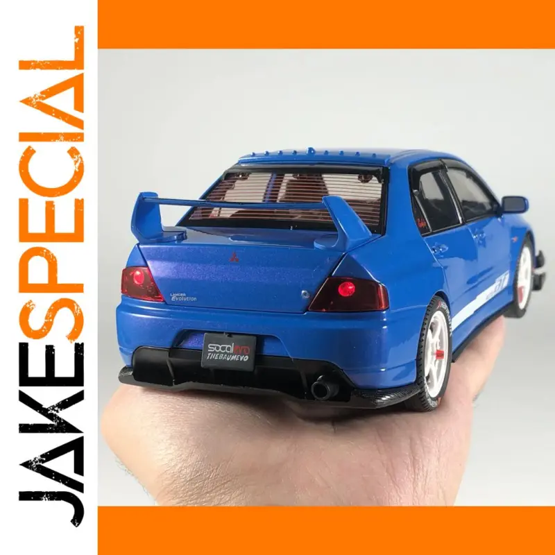 Discover the Detailing and Elegance of the Blue Mitsubishi Lancer Evolution EVO9 Diecast Model 1 1cc819b6a88b4606a356d116 product image