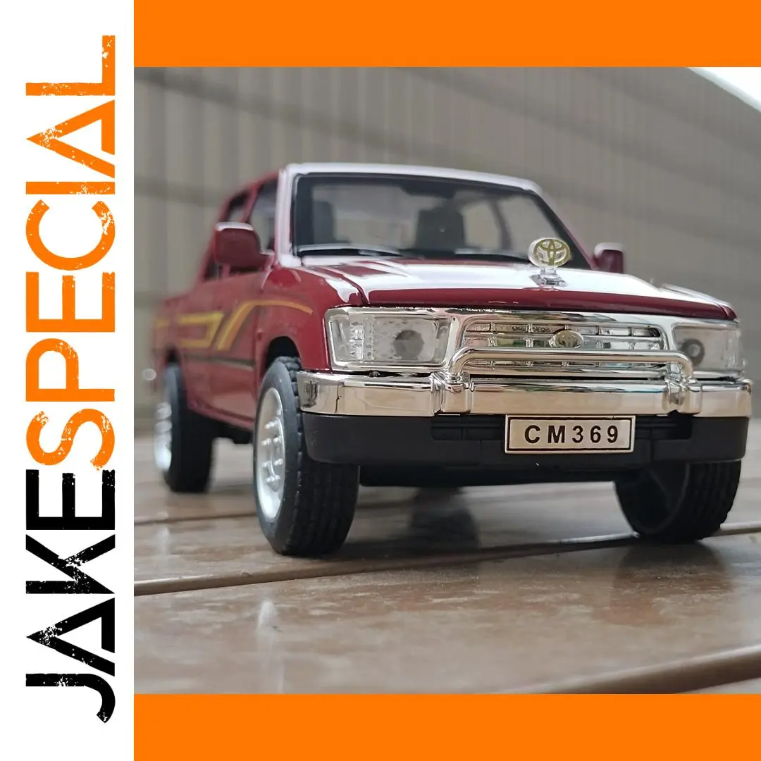 Vibrant Red Toyota Hilux Off-Road Diecast Model 1 Vibrant Red Toyota Hilux Off-Road Diecast Model