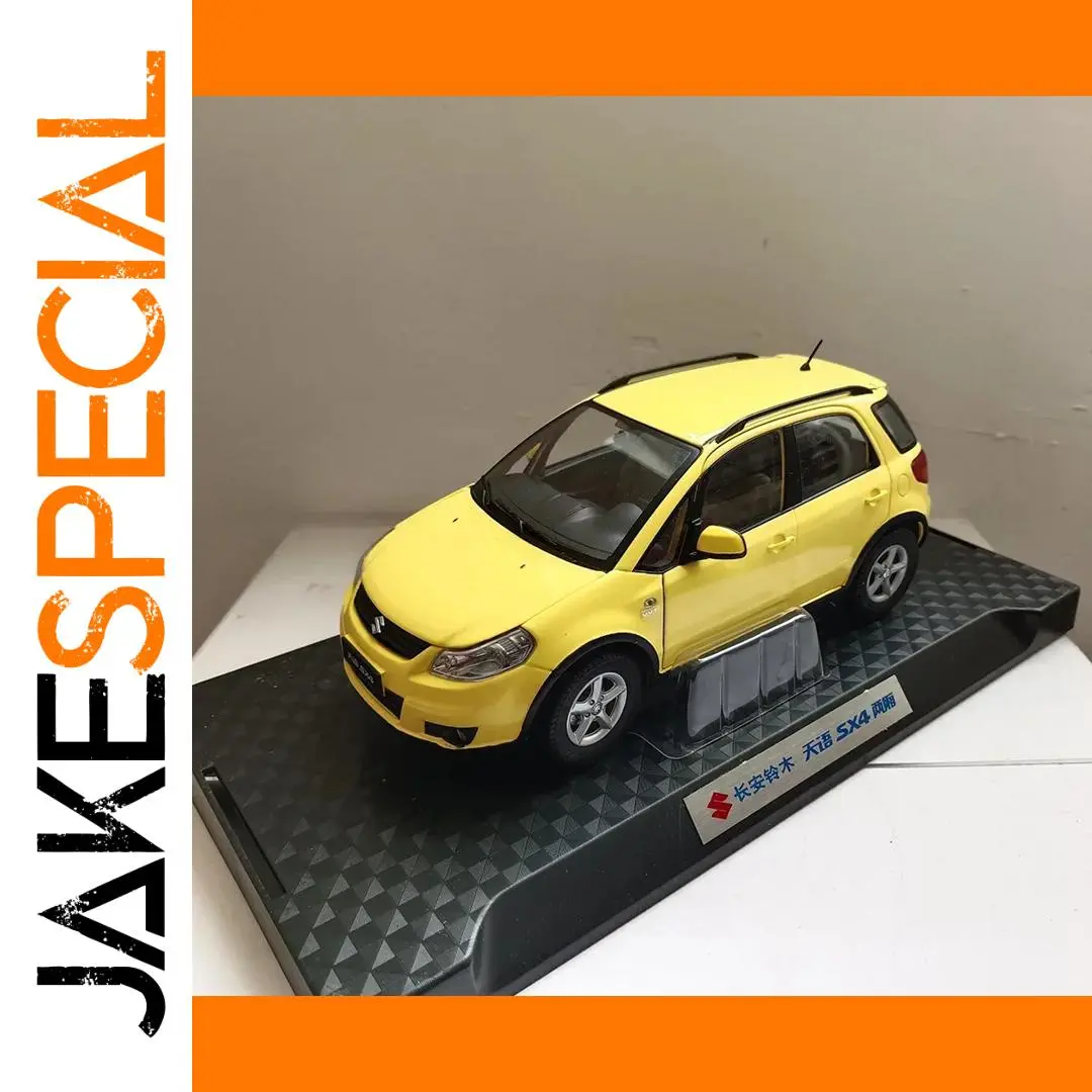 Vibrant Yellow 1:18 Scale SX4 Die-Cast Model 1 Vibrant Yellow 1:18 Scale SX4 Die-Cast Model
