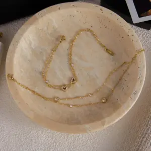 Elegant Gold-Tone Stainless Steel Beaded Bracelet 11 A8693d057faa74f96a7ce4f34309f7d37V