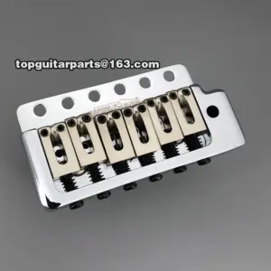 Wilkinson Chrome Tremolo Guitar Bridge with Adjustable Saddles 12 He5f9b704cd0f44a4be62bb5dce1debbca