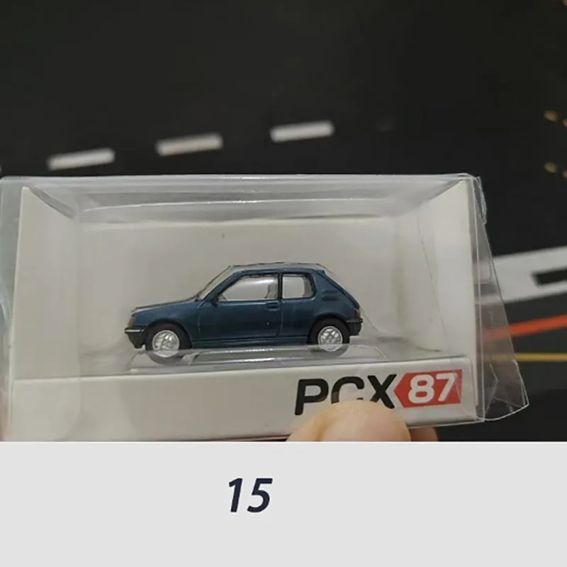 Vibrant Red 1/87 Scale Diecast Car Model 2 Vibrant Red 1/87 Scale Diecast Car Model - Image 2