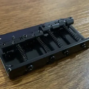 Professional 4-String Bass Guitar Bridge with Finishes 11 S0ca866d8e83c485294c02d1ad3d46f2ad