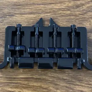 Thunderbird-style 4-String Bass Bridge in Chrome/Black 9 S0d6cd0f4bc094b1b8aed26b866194b80U