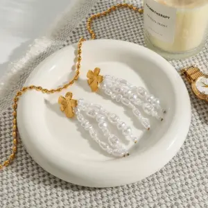 Gold Stainless Steel Floral Earrings with Pearls 11 S0e643f55ddfa4fcf9f8e40a2d95ff5edA