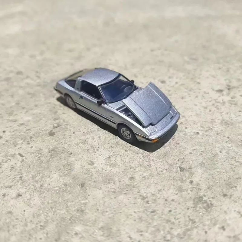 Silver 1982 Mazda RX-7 Diecast Model 1/64 Scale 5 Silver 1982 Mazda RX-7 Diecast Model 1/64 Scale - Image 5