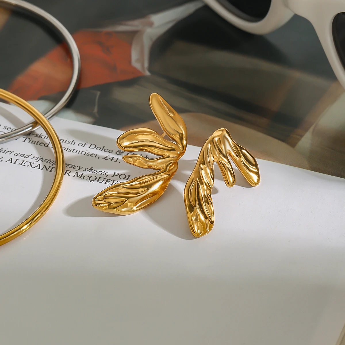 Stainless Steel Gold Leaf Earrings JDE0312006 5 Stainless Steel Gold Leaf Earrings JDE0312006 - Image 5