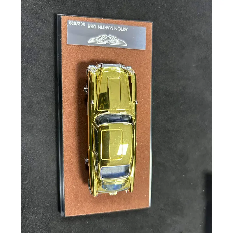 Gold Aston Martin DB5 1:64 Diecast Model 2 Gold Aston Martin DB5 1:64 Diecast Model - Image 2