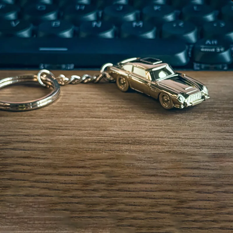 Gold Aston Martin DB5 Keychain for Collectors 4 Gold Aston Martin DB5 Keychain for Collectors - Image 4
