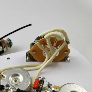 White Electric Guitar Wiring Harness with Gold Knobs 11 S181770c2de1e4fd695ee8690bf6753adq