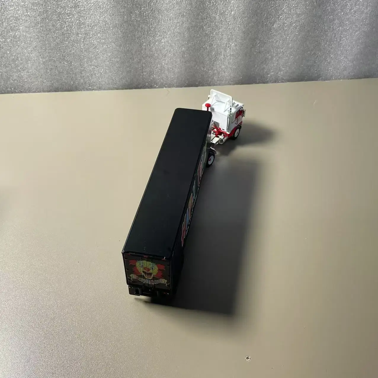 1:64 Diecast Freightliner Truck Model with Vibrant Trailer 3 1:64 Diecast Freightliner Truck Model with Vibrant Trailer - Image 3