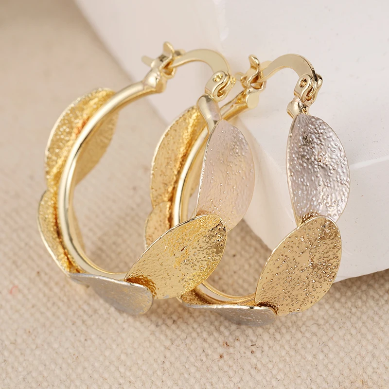 Geometric Oval Hoop Earrings in Silver & Gold 6 Geometric Oval Hoop Earrings in Silver & Gold - Image 6