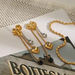 Stainless Steel Folded Heart Earrings 12 S3621579ff5a3407bafa9bddafd2e44d0p