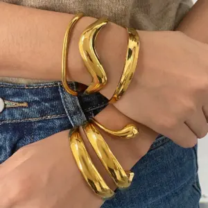 Stainless Steel Gold-Toned Wave Cuff Bracelet 11 S4a27df0ef50e4098bc0056d6e3af8280J