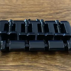 Thunderbird-style 4-String Bass Bridge in Chrome/Black 11 S4fccae397e294402ab9e2bd497f067e3J